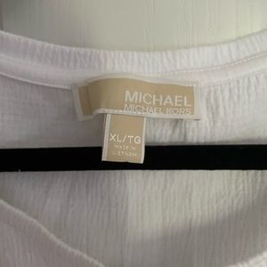 Michael Kors white sleeveless top.